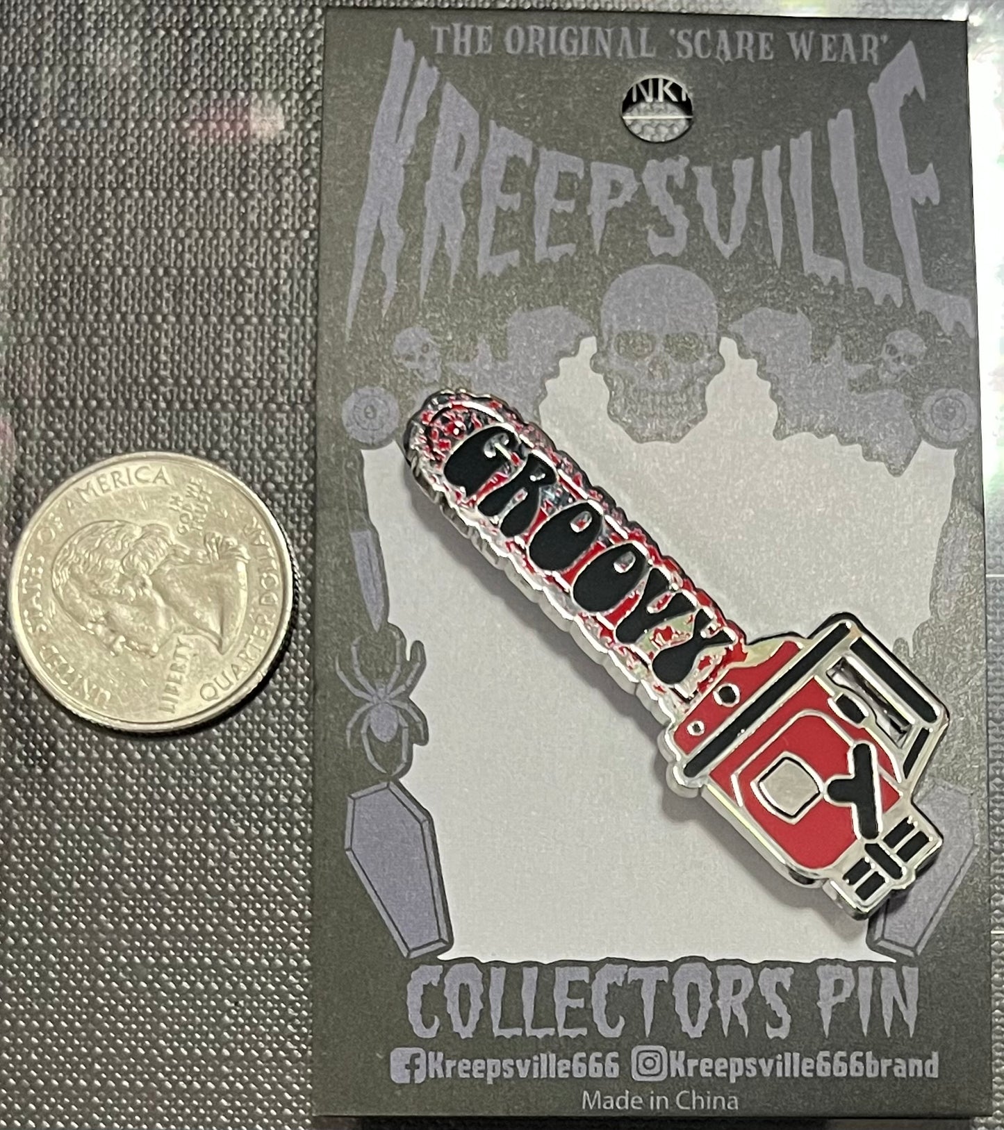 GROOVY CHAINSAW ENAMEL PIN